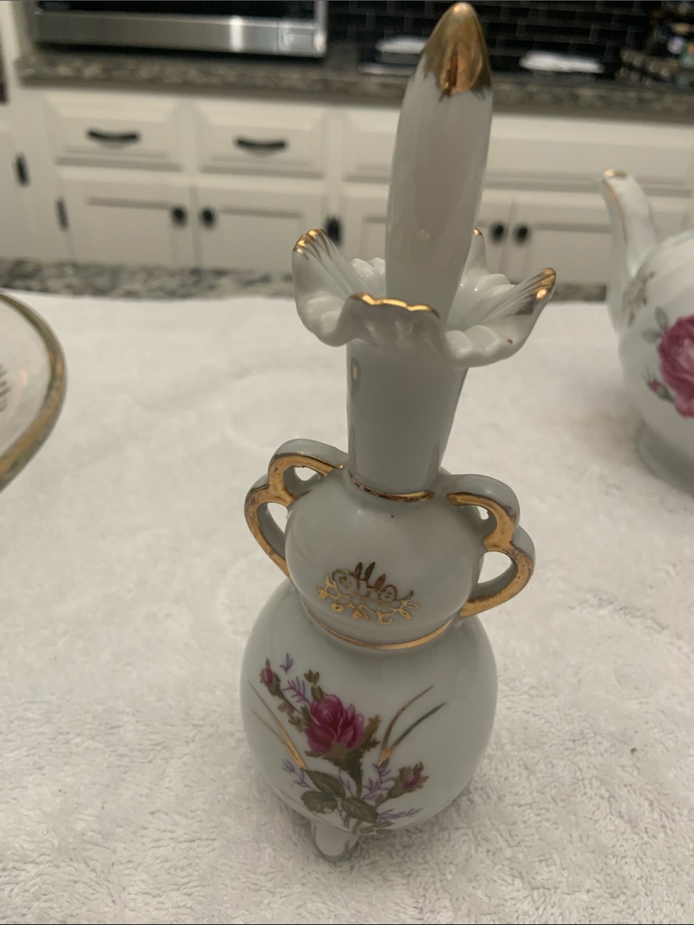 Elegant White Porcelain Bud Vase with Gold Trim and Pink Floral Accent
